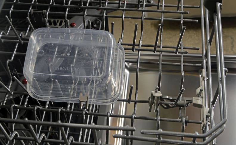 Adjustable tines dishwasher top